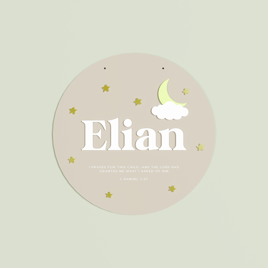 Round oat name plaque with 'Elian' in white with 1 Samuel 1:27 and a star and moon design | Saint Sauvant Auckland NZ