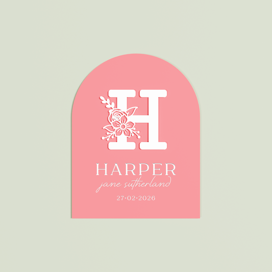 Decorative watermelon coloured arch with floral letter 'H' in White | Saint Sauvant Auckland NZ