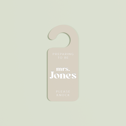 Oat Alba door hanger with 'Preparing to be mrs. Jones please knock' white text | Saint Sauvant Auckland NZ