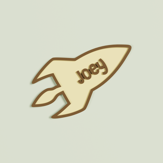 Peach rocket-shaped name plaque with 'Joey' in Chocolate | Saint Sauvant Auckland NZ