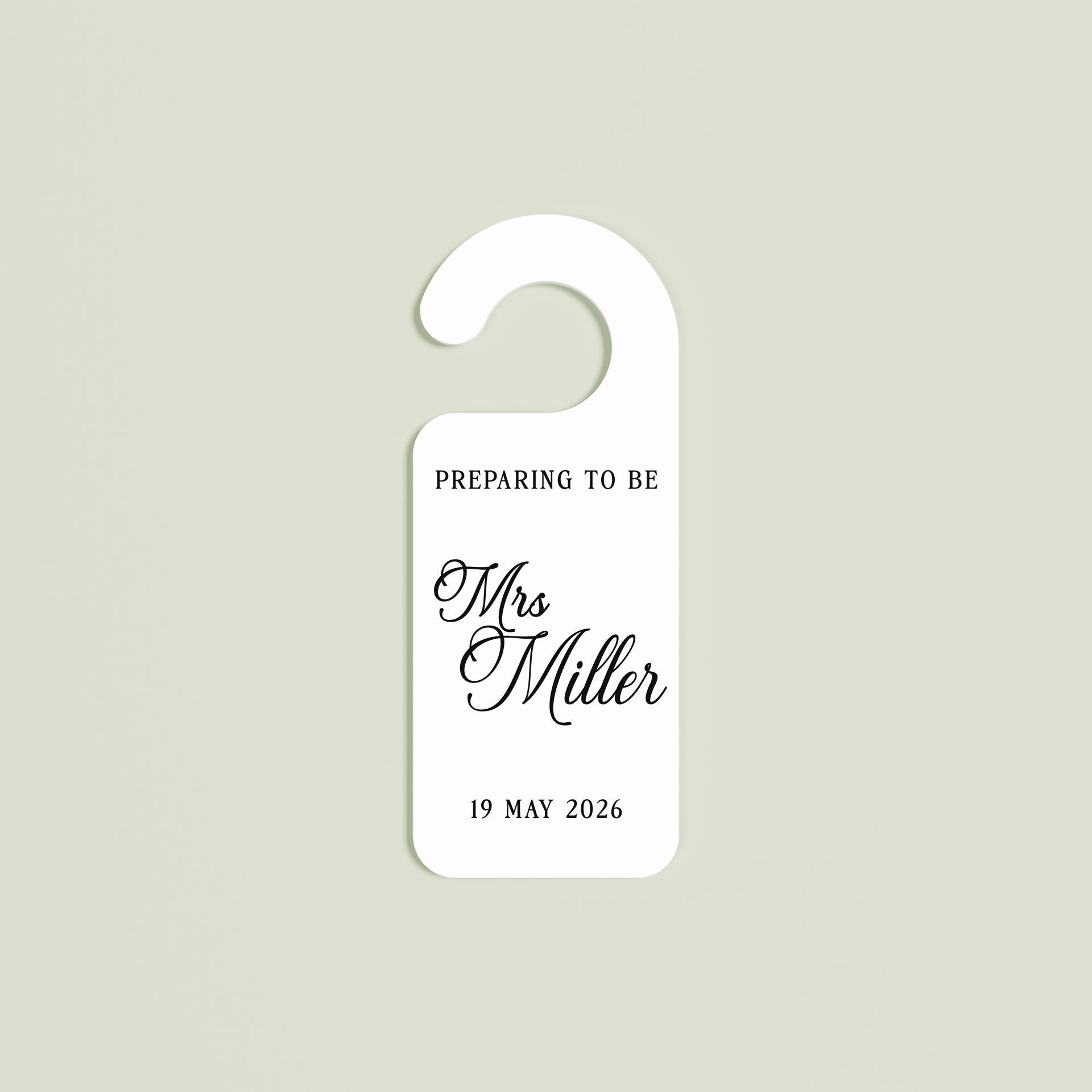 White Promesse door hanger with 'Preparing to be Mrs Miller 19 May 2026' black text | Saint Sauvant Auckland NZ