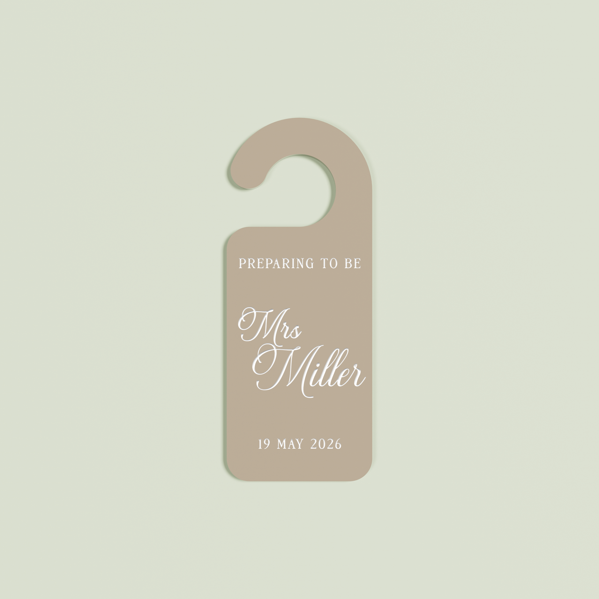 Light brown Promesse door hanger with 'Preparing to be Mrs Miller 19 May 2026' white text | Saint Sauvant Auckland NZ