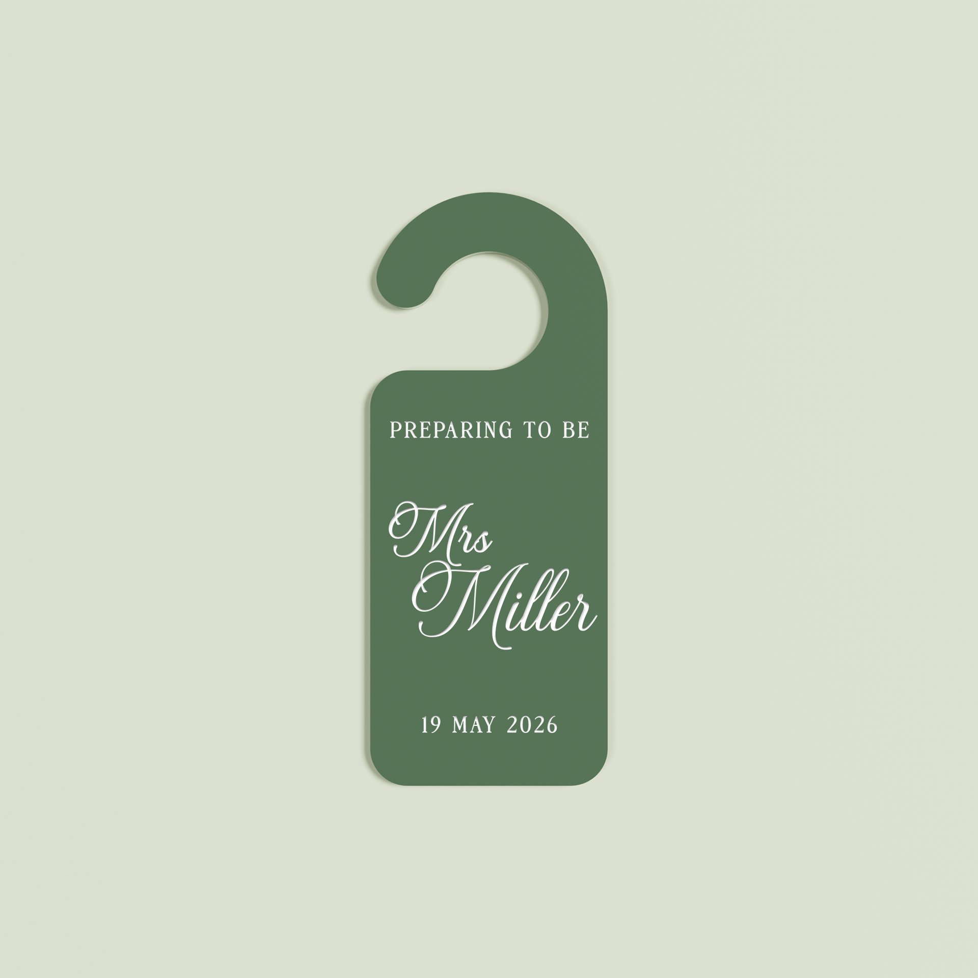 Sage Promesse door hanger with 'Preparing to be Mrs Miller 19 May 2026' white text | Saint Sauvant Auckland NZ