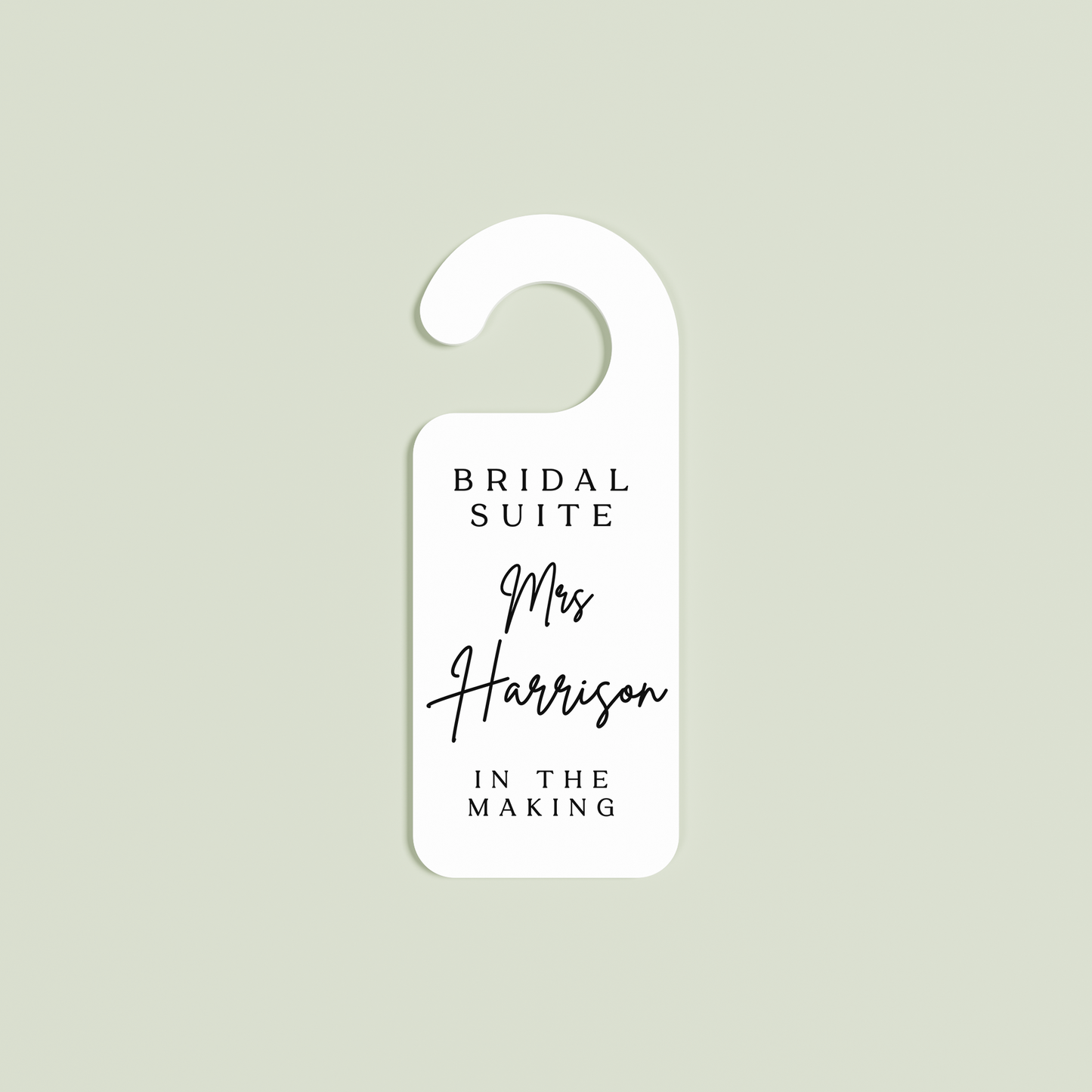 White Velo door hanger with 'Bridal Suite Mrs Harrison In The Making' black text | Saint Sauvant Auckland NZ