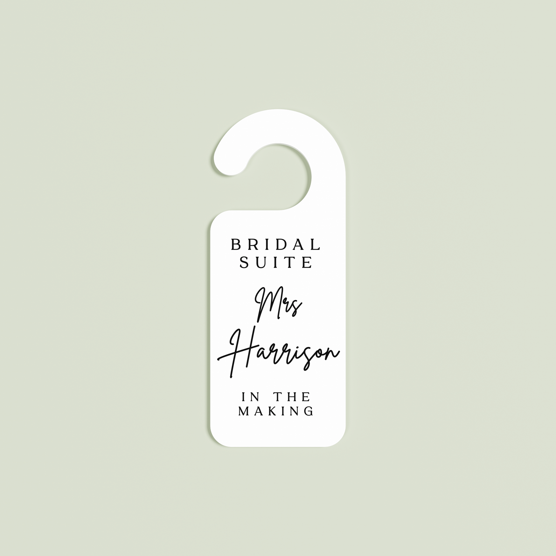 White Velo door hanger with 'Bridal Suite Mrs Harrison In The Making' black text | Saint Sauvant Auckland NZ