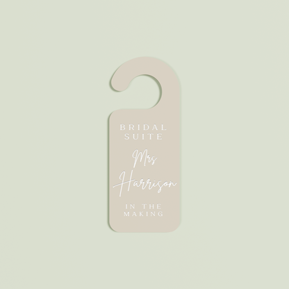 Oat Velo door hanger with 'Bridal Suite Mrs Harrison In The Making' white text | Saint Sauvant Auckland NZ